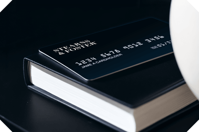 Image of a Financing Card Laying on a Book