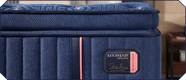hexagon shaped closed up of the Lux Estate mattress label