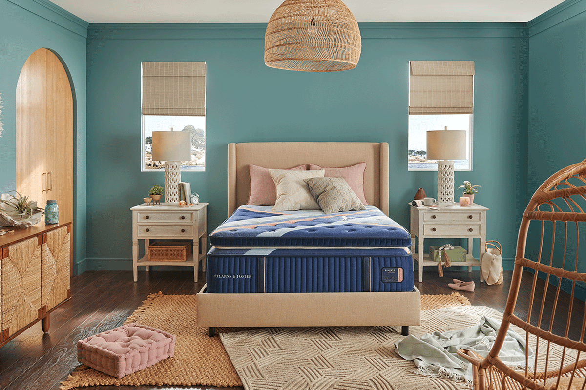 A stylishly colorful bedroom with a Stearns and Foster mattrress